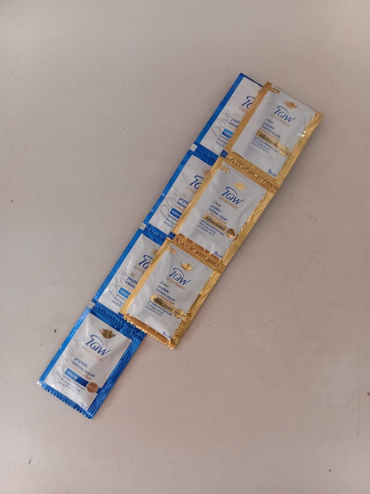 ຢາສາຫົວ ແລະ ຄິມນວດ ໂດບ 1 ໂຫຼ